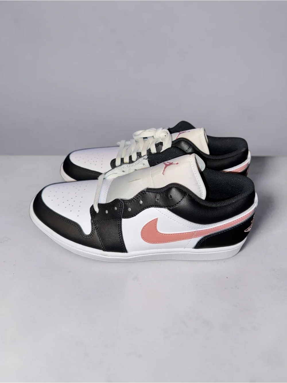 Air Jordan 1 Low “Rust Pink” / “Black Rust Pink.”